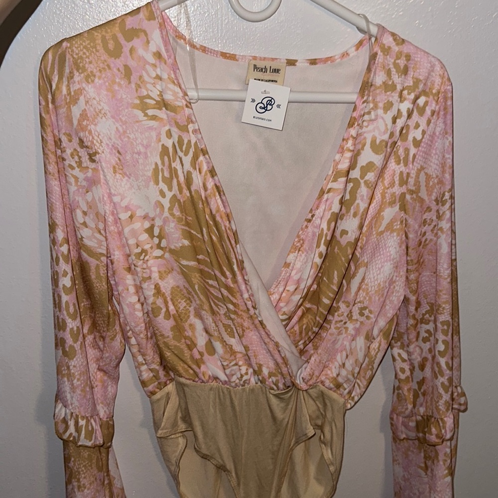 Super cute, soft pattern long flowy sleeve bodysuit